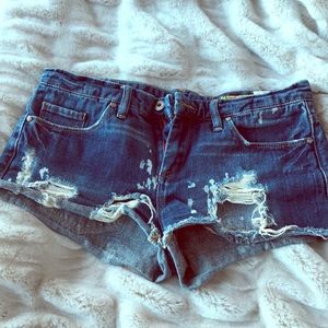 Distressed denim shorts